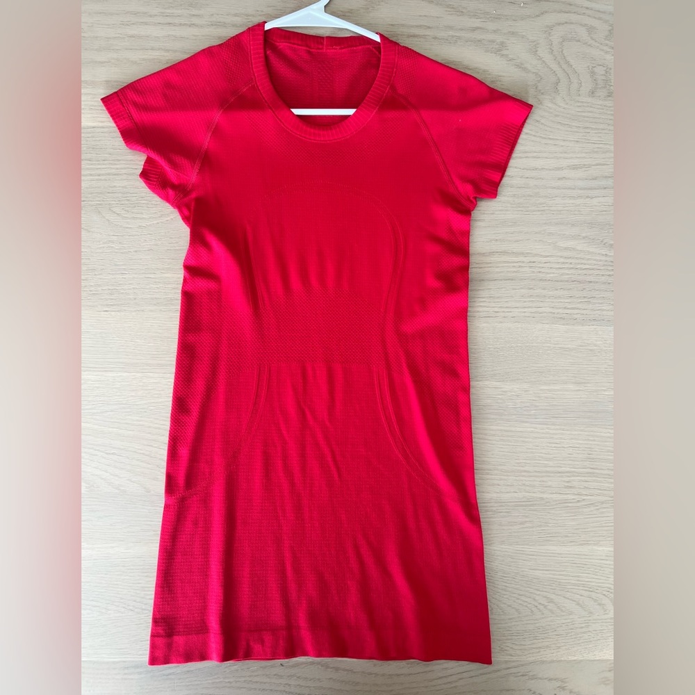 Lululemon short-sleeved red workout top size 2